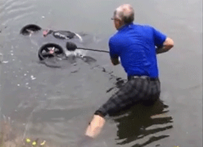 Drowning Cart In River GIF
