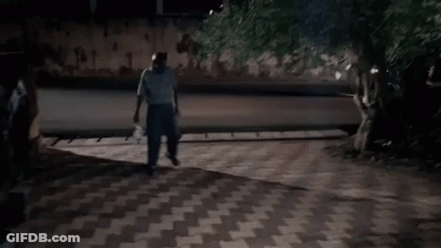 Drunk Guy Looking At Clock GIF