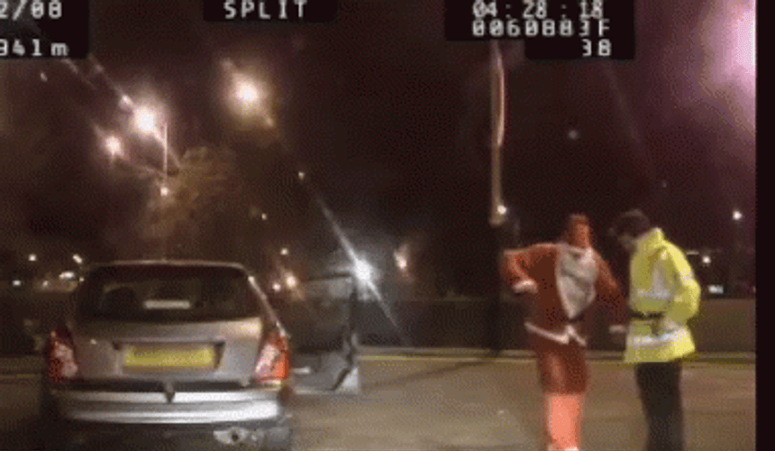 Drunk Santa Questioned By Police GIF