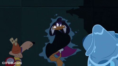 Duck In Purple Cape Standing Next To Dog GIF