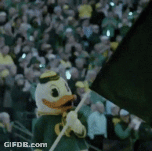 Duck Mascot Holding Flag GIF