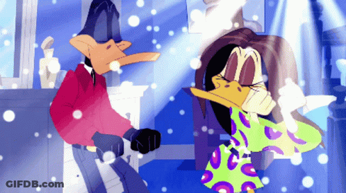 Duck Standing Next To Woman In Polka Dot Dress GIF