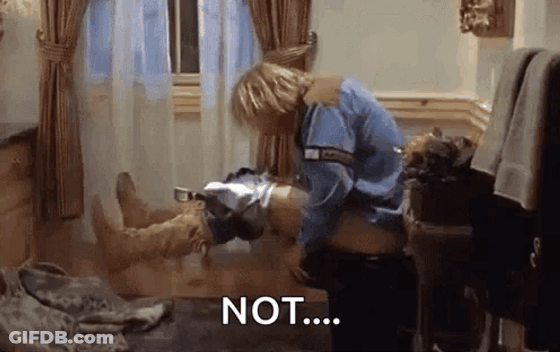 Dumb And Dumber Bathroom Squirming GIF