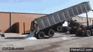 Dump Truck Being Loaded With Sand GIF