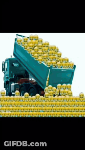 Dump Truck Filled With Smiley Faces Driving GIF