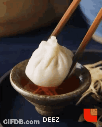 Dumpling Dipped In Sauce With Chopsticks Saying Deez GIF