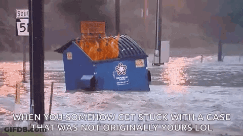 Dumpster On Fire In Flooded Area GIF