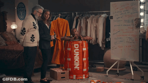 Dunkin' Barrel With Man Statue GIF