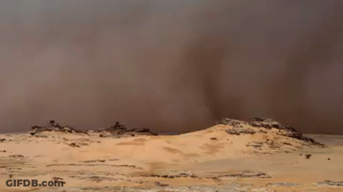 Dust Storm In Desert With Hills GIF