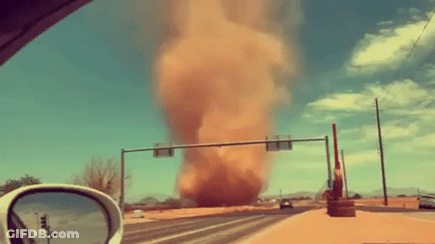 Dust Storm Spinning Sand Cloud Moving Along GIF