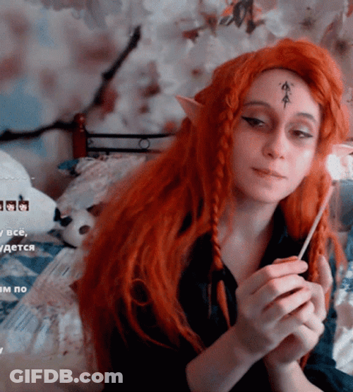 Dwarf Cosplayer Playing With Lighter GIF