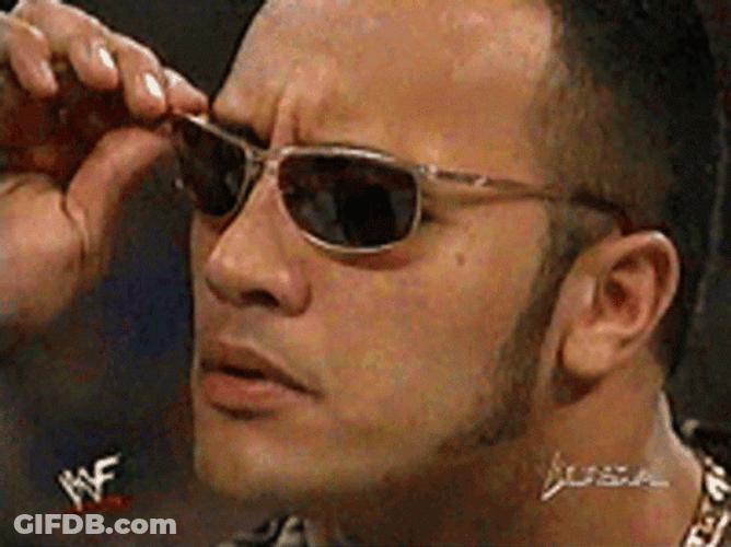 Dwayne Johnson Wwe Removing His Glasses GIF