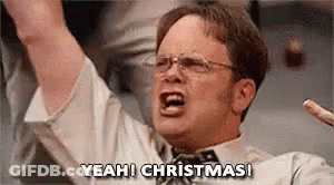 Dwight Schrute From The Office Is Screaming With His Arms In The Air And Saying `` Yeah ! Christmas ! '' GIF