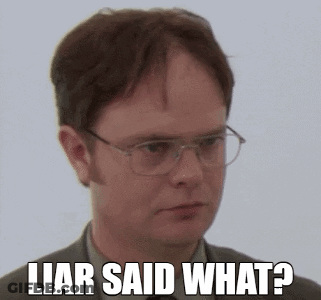 Dwight Schrute From The Office Is Wearing Glasses And Making A Funny Face . GIF