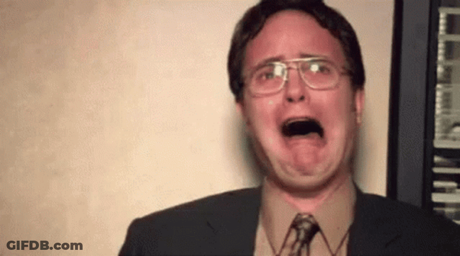 Dwight Schrute The Office Tongue Sticking Out GIF