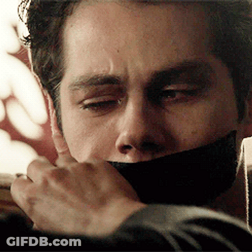 Dylan O'Brien Removing Tape Void Stiles GIF