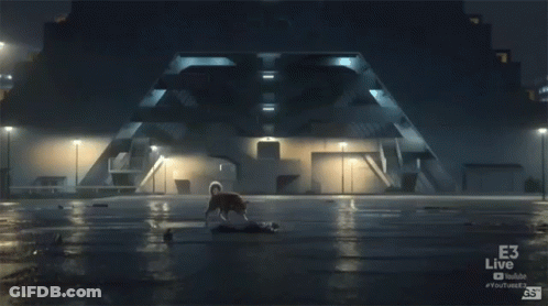 E3 Live Ad Dog Standing Next To Dead Body GIF