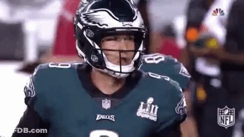 Eagles Football Player With Helmet On Field GIF