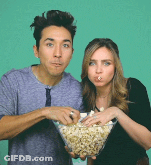 Eating Popcorn Interested GIF