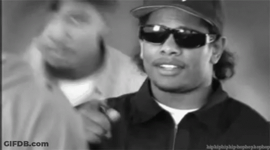 Eazy E Wearing Dark Shades Pointing GIF