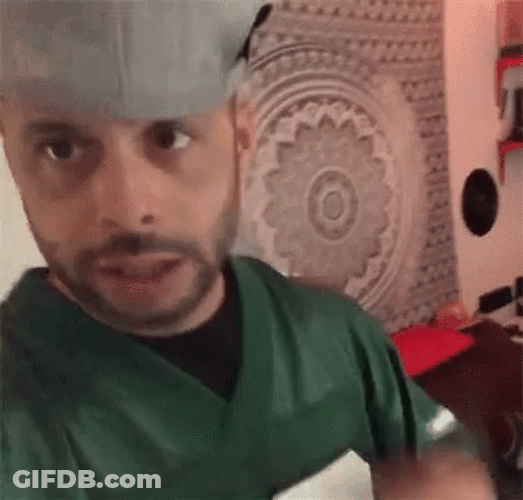 Ed Bassmaster Shows Yolo Hand Sign GIF