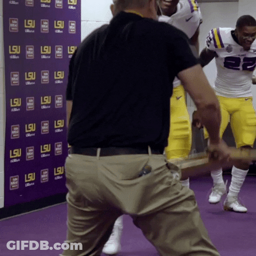Ed Orgeron Smashing Steel Chair GIF