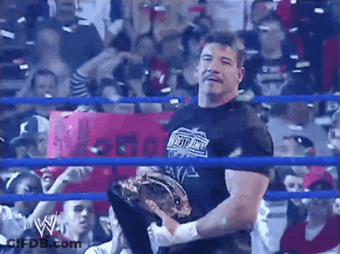 Eddie Guerrero Wearing Belt Raining Confetti GIF