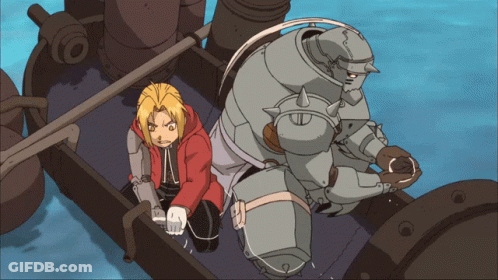 Edward And Alphonso Standing On A Boat GIF