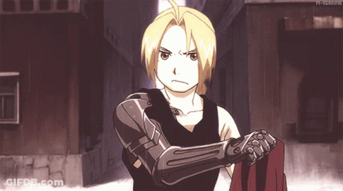 Edward Elric From Full Metal Alchemist Is Standing In A Narrow Alleyway GIF