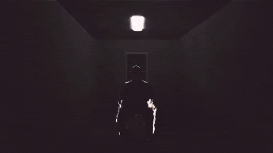 Eerie Silhouette Of A Man On Fire GIF