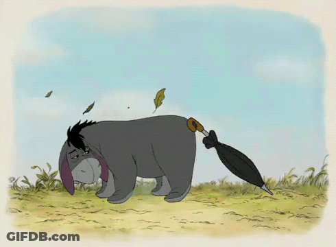 Eeyore Holding Umbrella In Mouth GIF