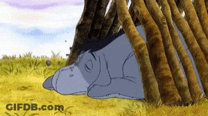 Eeyore Sleeping In Grass GIF