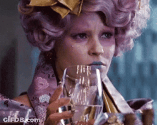 Effie Trinket Puzzled Reaction Hunger Games GIF