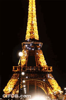 Eiffel Tower Lit Up At Night GIF