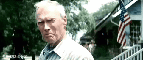 Elderly Man By House With American Flag GIF