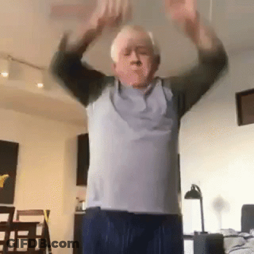 Elderly Man Dancing In Living Room GIF