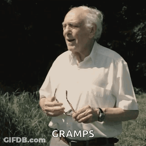 Elderly Man Holding Glasses Says Gramps GIF