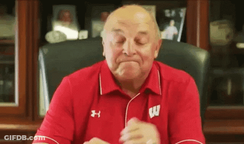 Elderly Man In Red Shirt With Letter W GIF