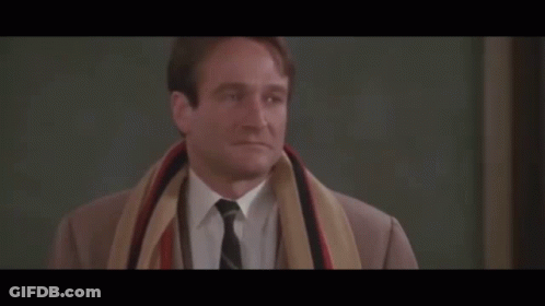 Elderly Man In Suit And Tie Looking At Camera GIF