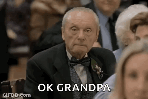Elderly Man In Tuxedo Sitting GIF
