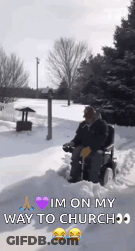 Elderly Man In Wheelchair Driving Through Snow GIF