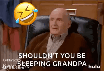 Elderly Man Sitting In Chair Laughing Emoji GIF