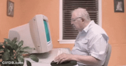 Elderly Man Typing On Keyboard GIF
