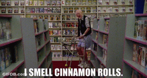 Elderly Man With Walker Smelling Cinnamon Rolls GIF