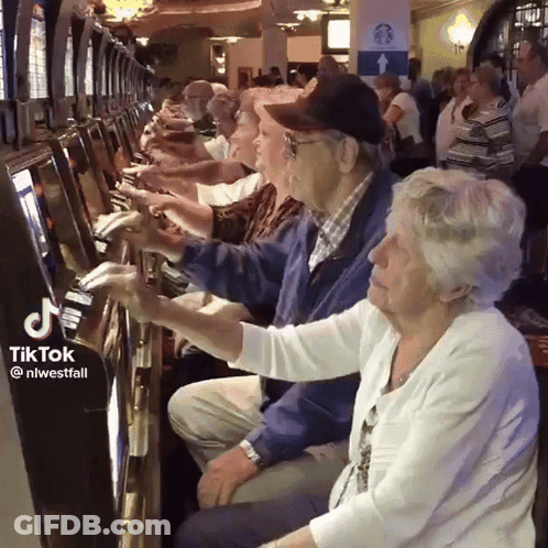 Elderly People Playing Video Game At Casino GIF