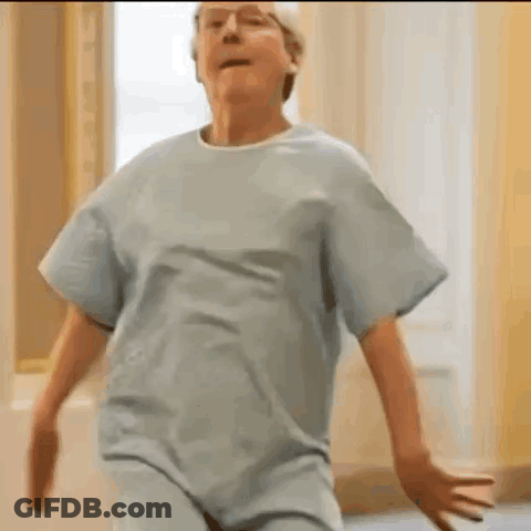 Elderly Woman Dancing In Hospital Gown GIF