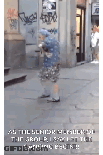 Elderly Woman Dancing On Sidewalk Let The Dancing Begin GIF