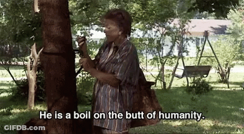 Elderly Woman Holding Hammer Saying He Is A Boil On The Butt Of Humanity GIF
