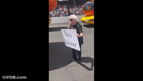 Elderly Woman Holding Nice Wiener Sign GIF
