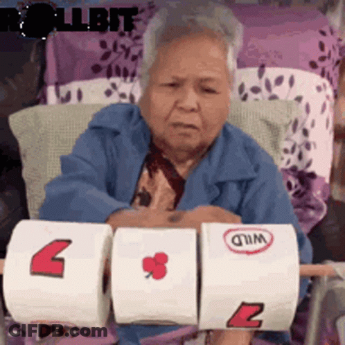 Elderly Woman Holding Toilet Paper Rolls GIF
